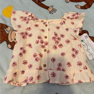 Carter's Cream and Pink Floral Baby Top Sizs 18 Months. New with tags.